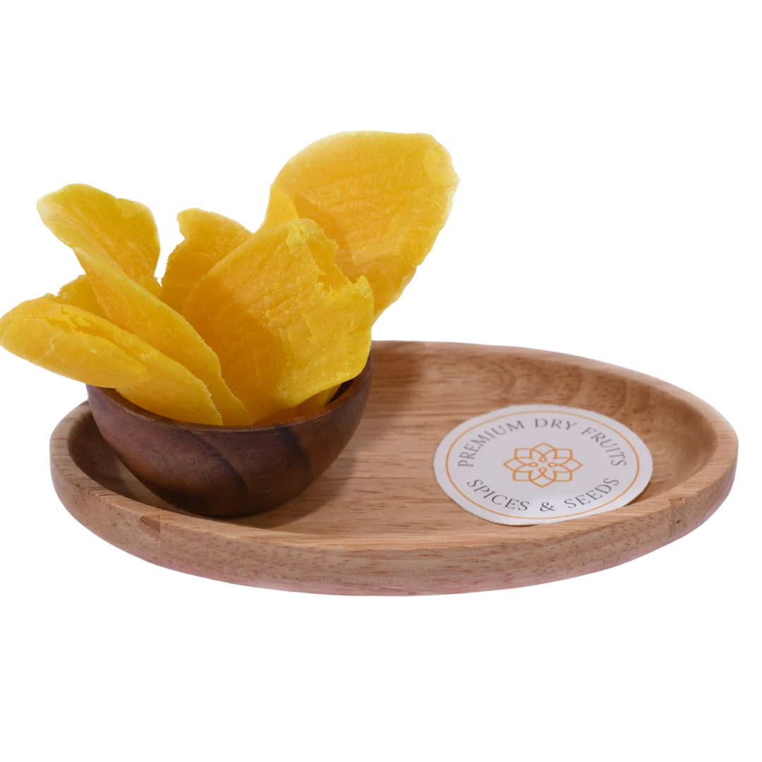 Bright yellow Dried Mango Slices in a wooden bowl, showing their soft, chewy texture and natural sweetness.