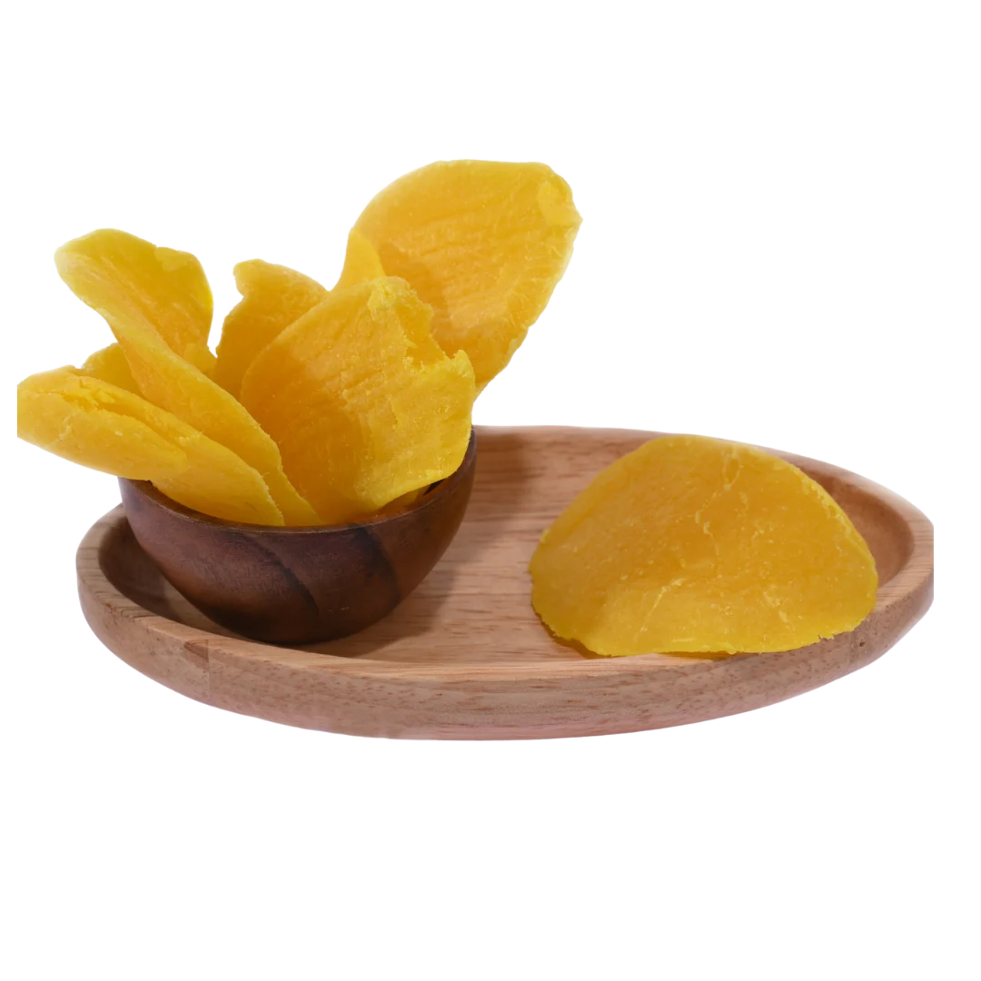 Naturally sun-dried Dried Mango Slices arranged in a rustic wooden bowl, perfect for healthy snacking.