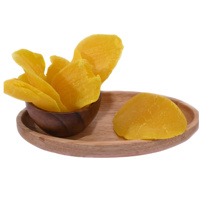 Naturally sun-dried Dried Mango Slices arranged in a rustic wooden bowl, perfect for healthy snacking.