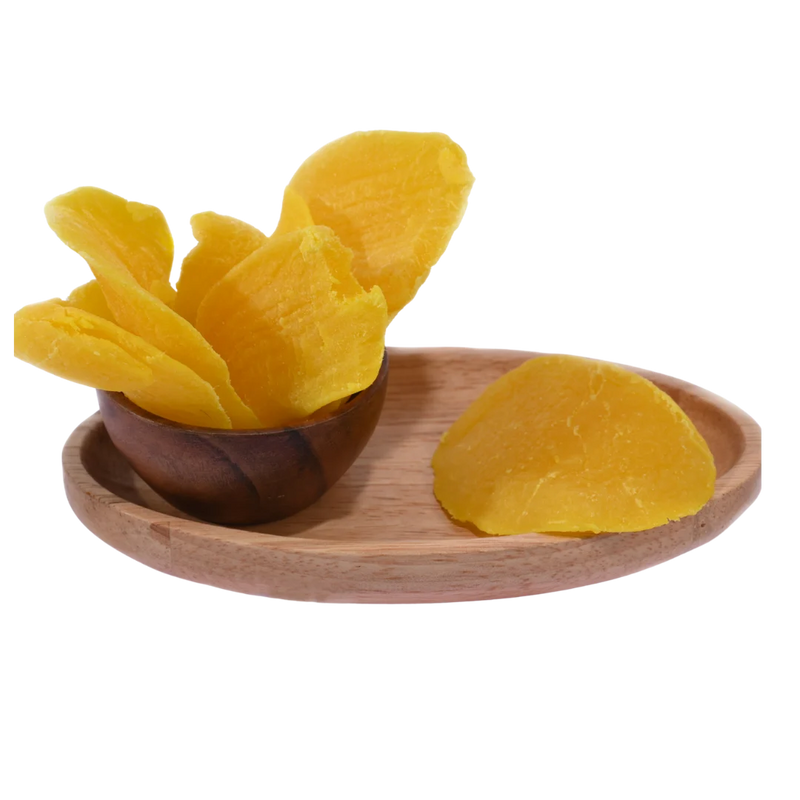 Naturally sun-dried Dried Mango Slices arranged in a rustic wooden bowl, perfect for healthy snacking.
