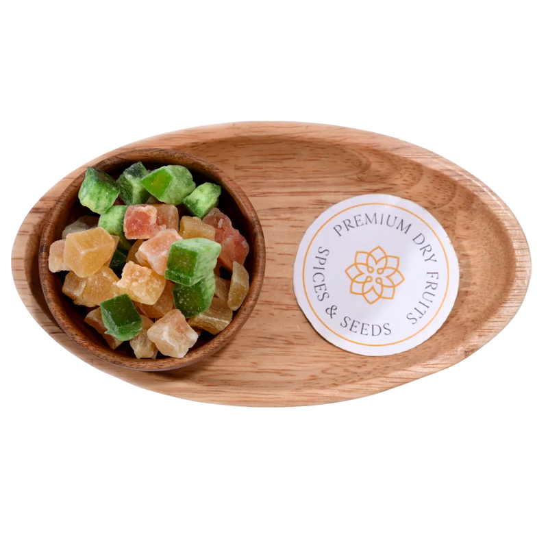 Close-up of assorted Dried Mixed Fruit Dice in a rustic wooden bowl.
