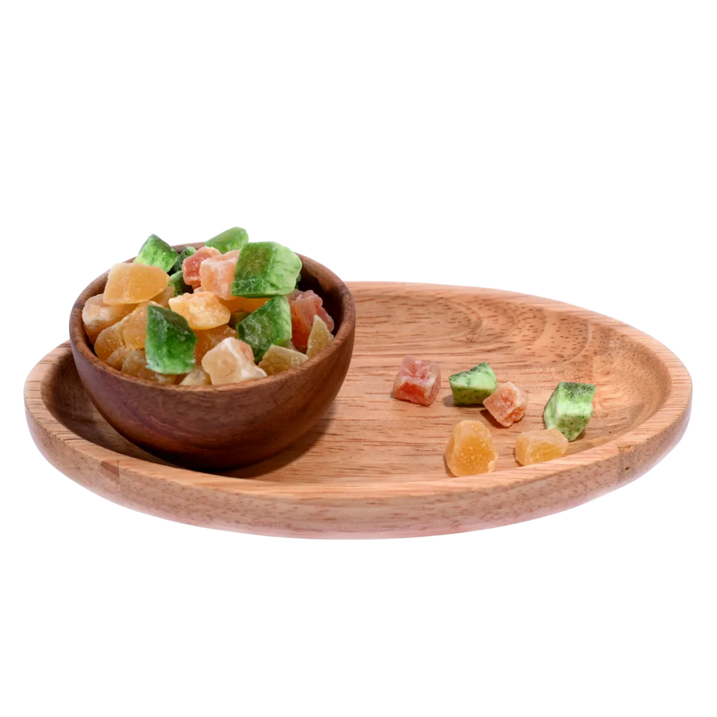 Top view of vibrant Dried Mixed Fruit Dice arranged in a round wooden bowl.