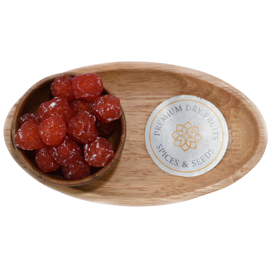 Dried Roseberry Plums neatly arranged in a wooden bowl, highlighting their glossy finish and delicious taste.