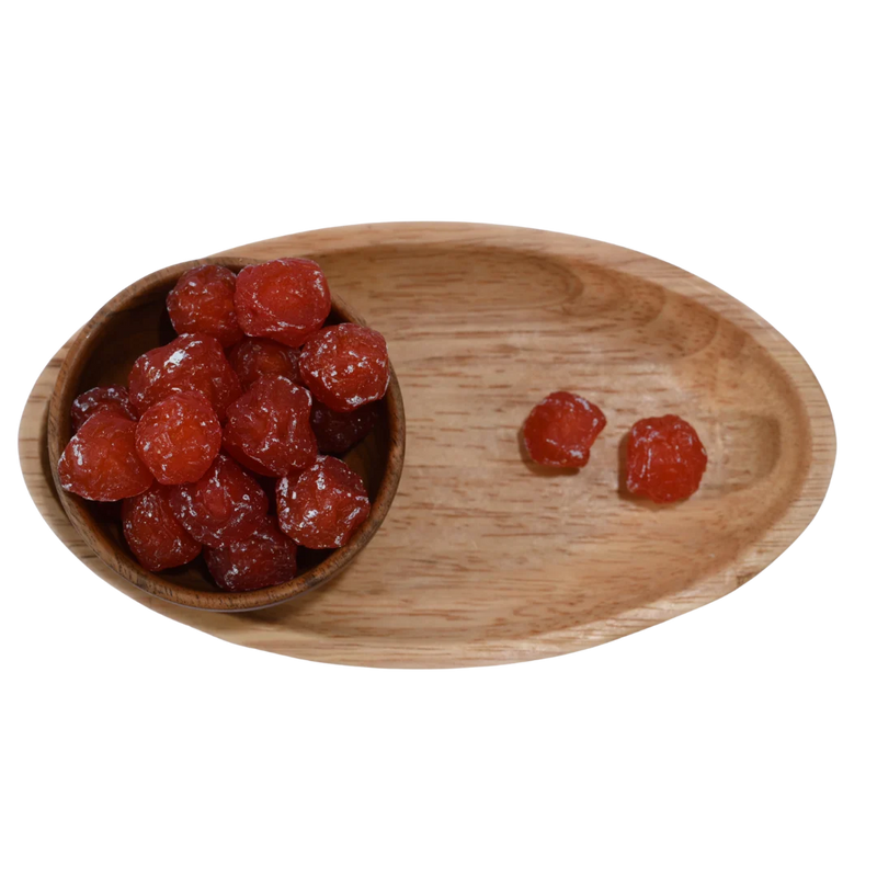 Freshly packed Dried Roseberry Plums in a wooden bowl, perfect for healthy snacking and gourmet gifting.