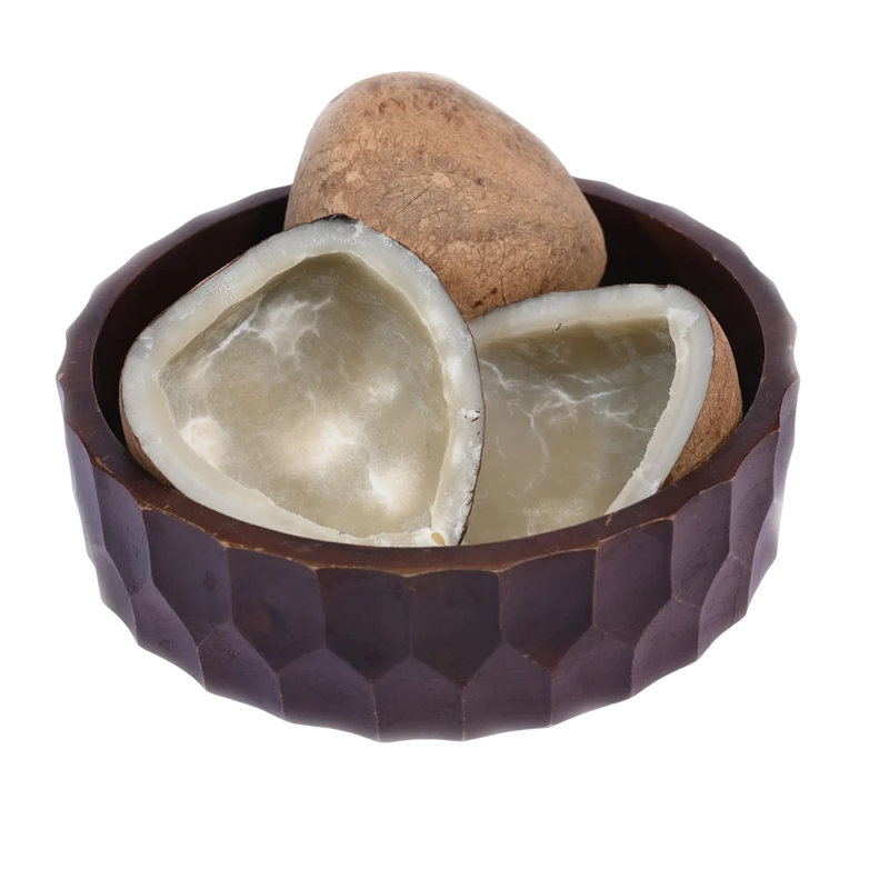 Premium quality Dry Coconut Halves / Copra arranged in a rustic wooden bowl, perfect for cooking or snacking.