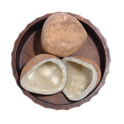 Fresh Dry Coconut Halves / Copra in a wooden bowl, showing natural color, texture, and organic appeal.