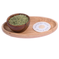 Fennel Lucknow / Saunf in a wooden bowl showcases premium, aromatic seeds from Lucknow.