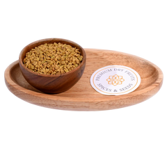 Fenugreek Seeds / Methi Seeds in a wooden bowl showcase fresh, high-quality seeds.