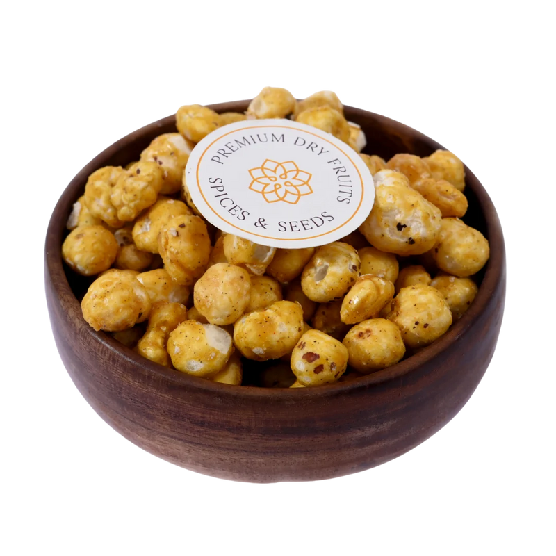 Fox Nuts Caramel Glazed Makhana are crunchy roasted fox nuts coated with a glossy golden caramel layer, giving a perfect sweet crunch.
