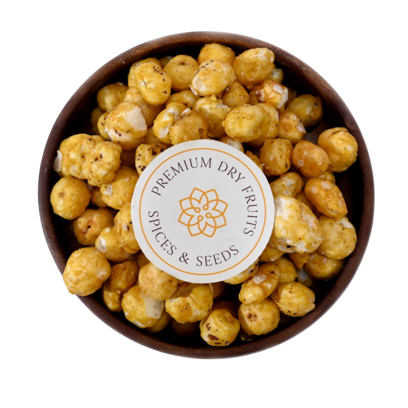 The Fox Nuts Caramel Glazed Makhana snack combines light, airy makhana with a smooth caramel glaze for a deliciously rich flavor.
