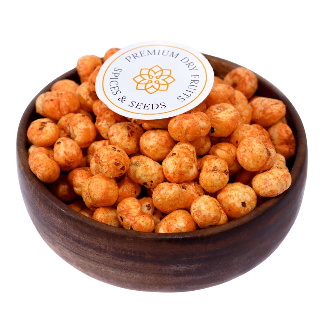 Crunchy and flavorful, Fox Nuts Fiery Peri Peri Spiced are roasted to perfection and coated with bold peri peri seasoning in a wooden bowl.