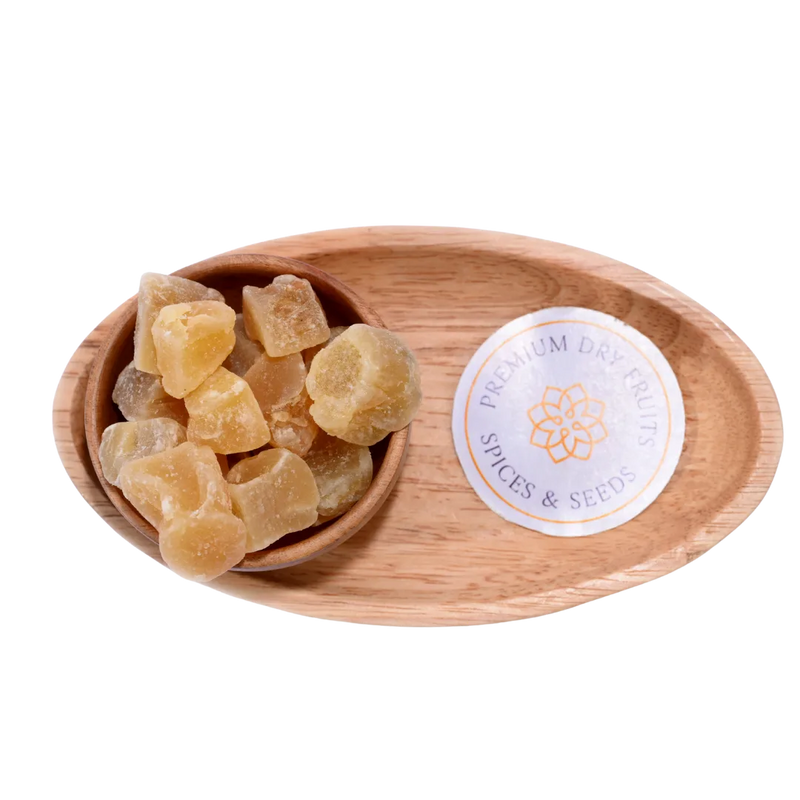 Close-up of Ginger Candy Dry cubes coated with sugar, highlighting their chewy texture and natural ginger aroma.