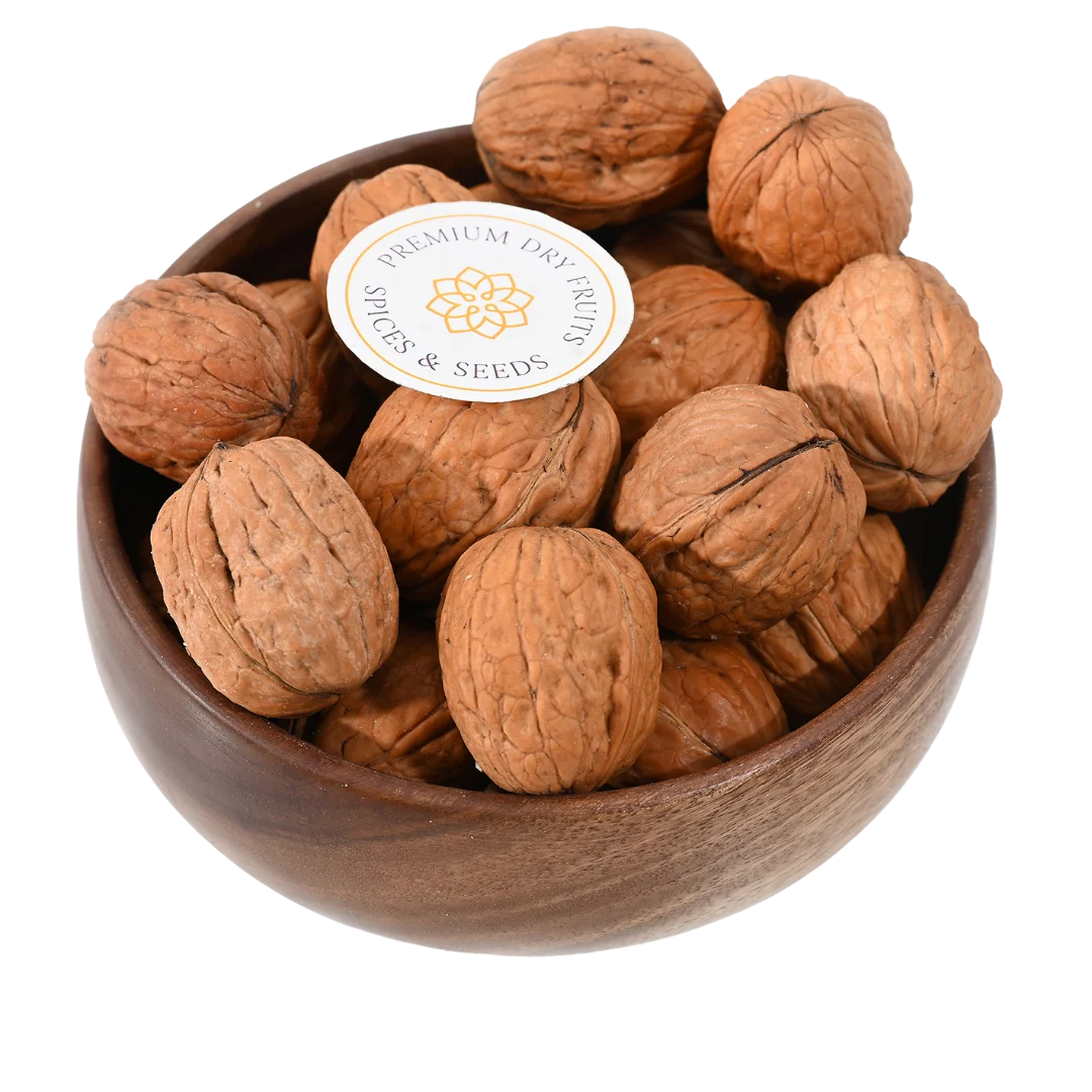 Premium Chile inshell walnuts in wooden bowl, Akhrot whole nuts, healthy snack