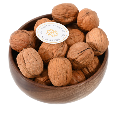 Premium Chile inshell walnuts in wooden bowl, Akhrot whole nuts, healthy snack