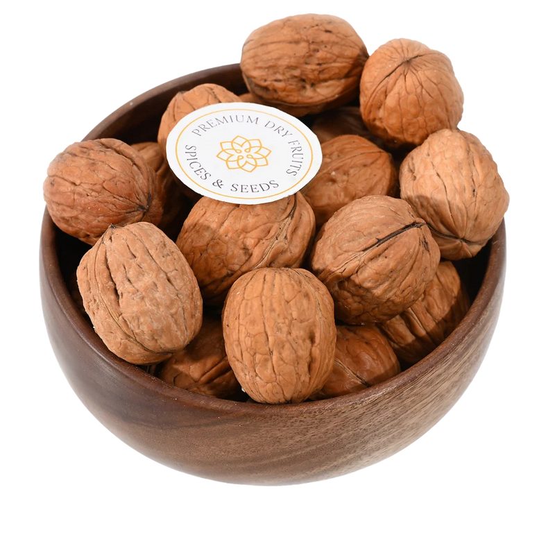 Premium Chile inshell walnuts in wooden bowl, Akhrot whole nuts, healthy snack