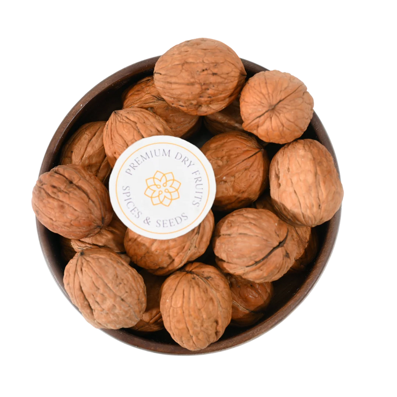 Whole inshell Chile walnuts close-up, rich brown shells, Akhrot premium quality