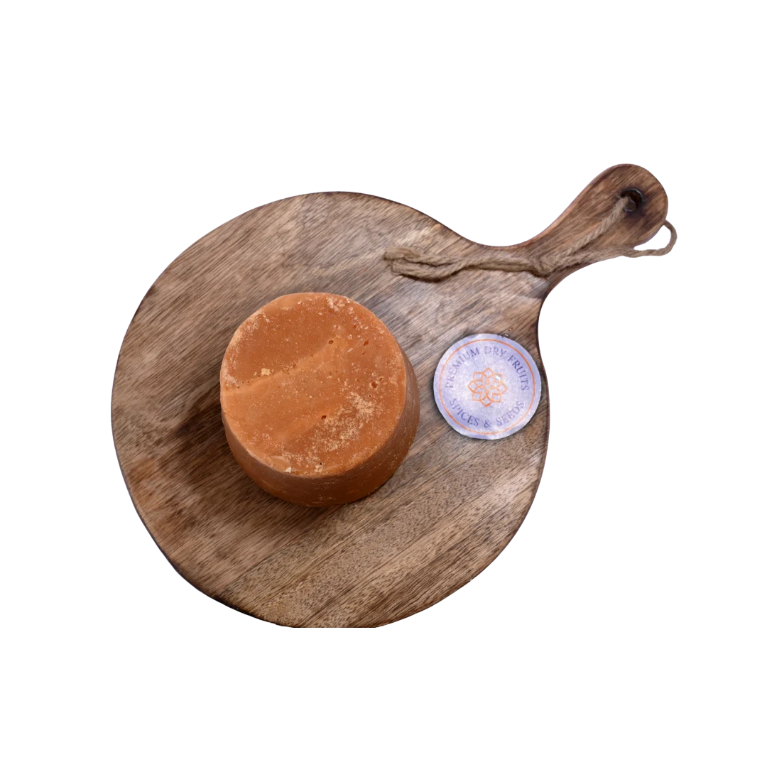 Close-up of Jaggery / Gud blocks, highlighting their crystalline surface and traditional unrefined form.