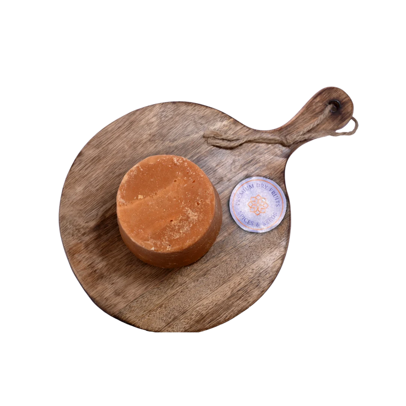 Close-up of Jaggery / Gud blocks, highlighting their crystalline surface and traditional unrefined form.