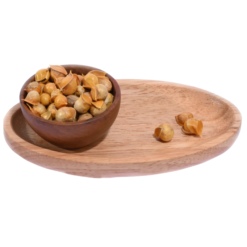 Fresh Kashmiri Garlic Single Clove Lahsun displayed in a rustic wooden bowl, known for its strong flavor and medicinal value.