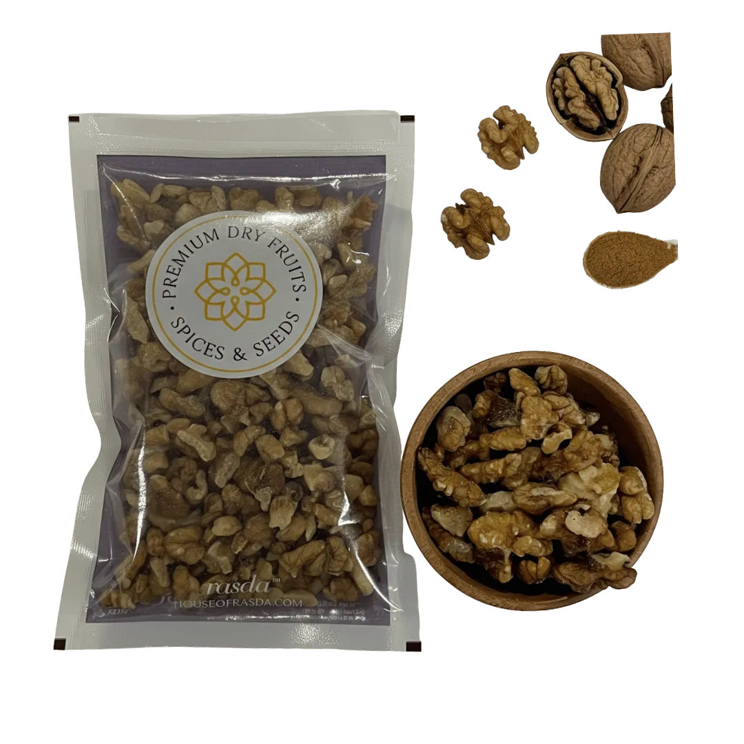 Packaged Kashmiri Walnuts (Akhrot) – Pieces with a bowl of walnuts and individual walnuts on a white background.