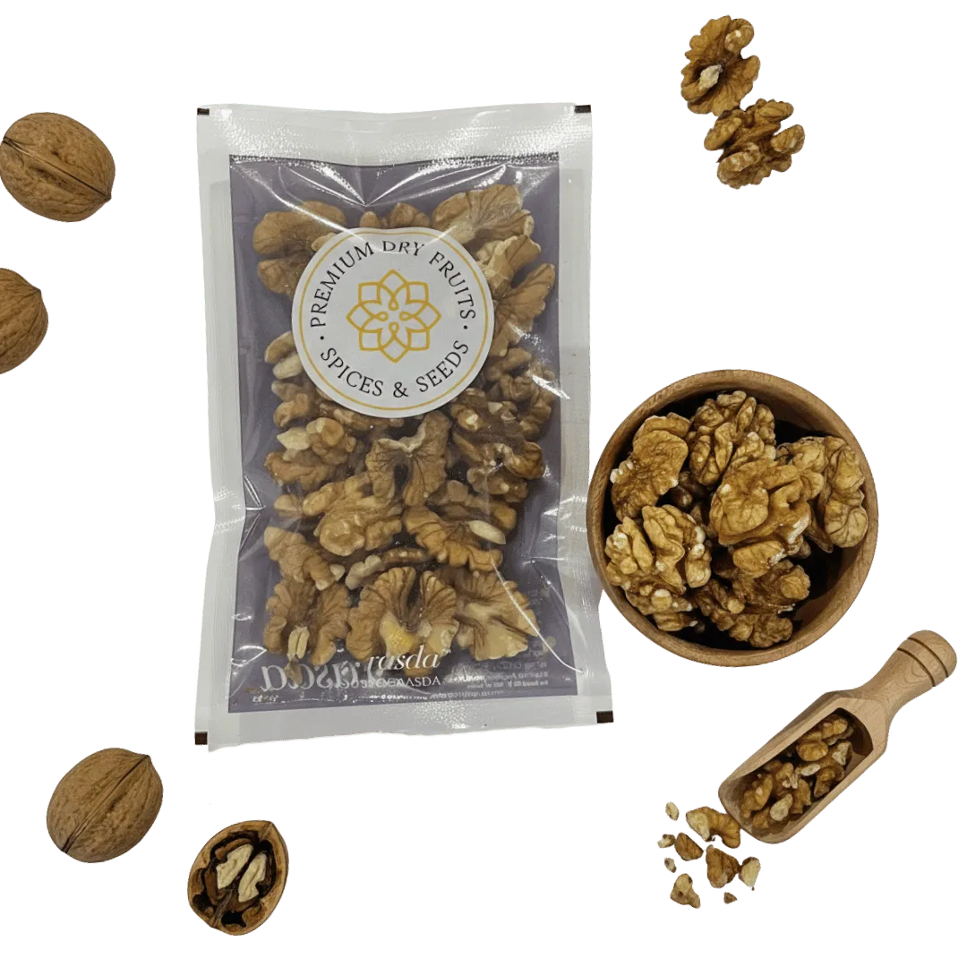 Packaged Kashmiri Walnuts (Akhrot) – Select Halves with a bowl, scoop, and scattered walnuts on a white background.