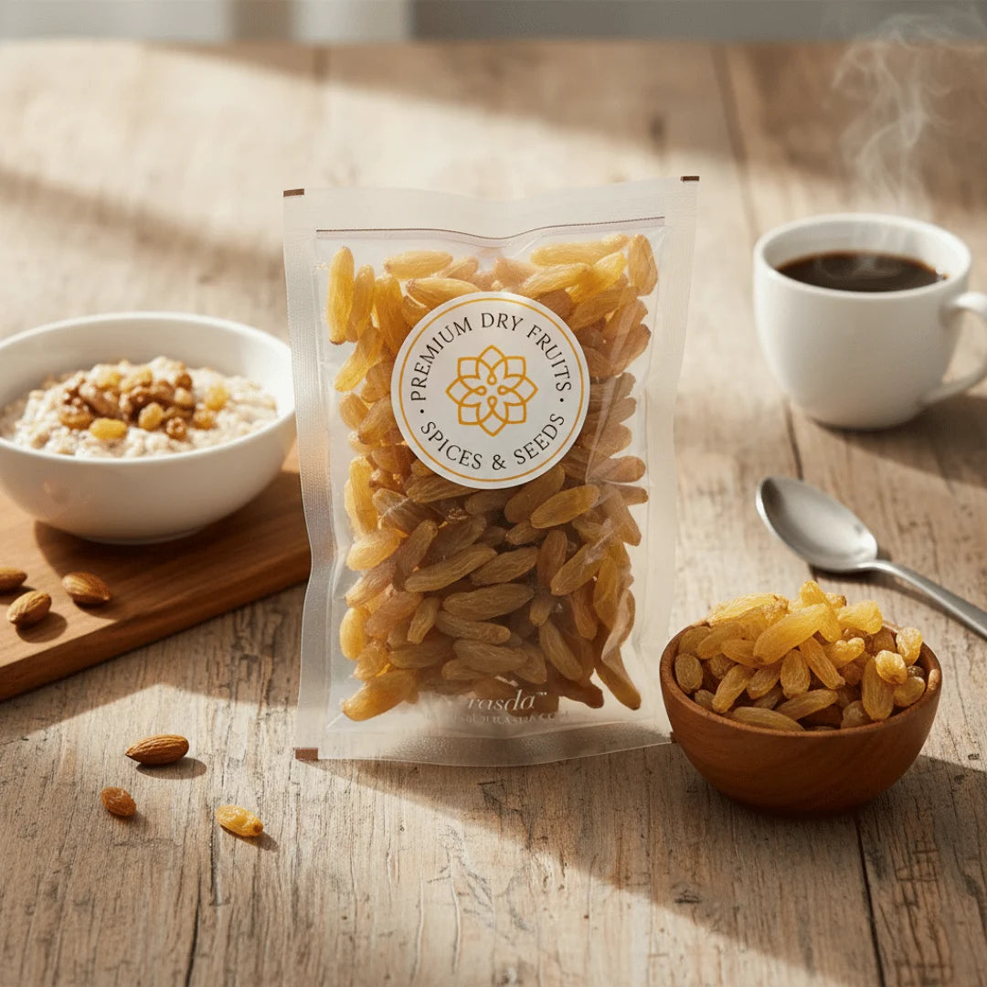 Packaged Long Raisins Premium on a wooden table with a bowl of cereal and a cup of coffee.