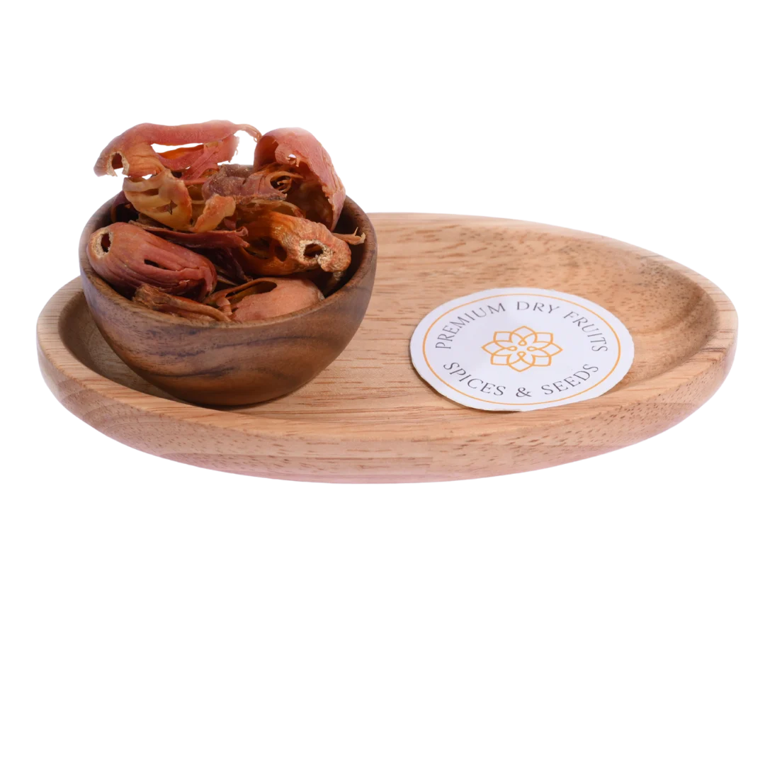 Mace / Nutmeg Flower / Javitri in a wooden bowl showcases vibrant red-orange spice strands.