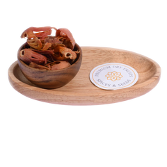 Mace / Nutmeg Flower / Javitri in a wooden bowl showcases vibrant red-orange spice strands.