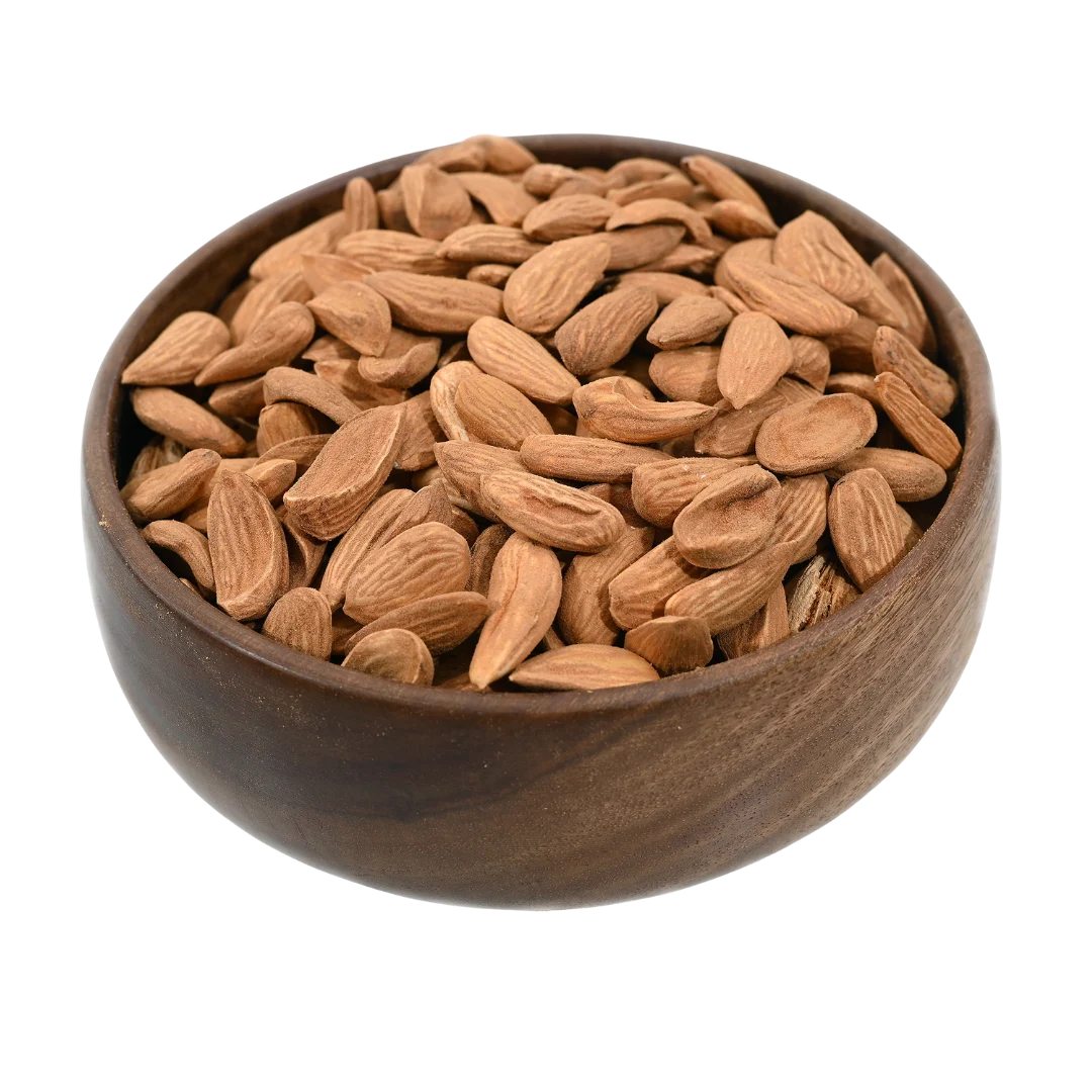 Premium Mamra Almonds Choice Badam on rustic surface – nutritious dry fruits for energy immunity and wellness