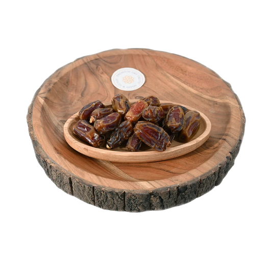 Mashrooq Dates Saudi Arabia Premium in wooden bowl – soft, sweet, and nutritious dates