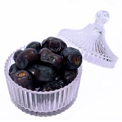 A bowl of Black color Mazafati Dates