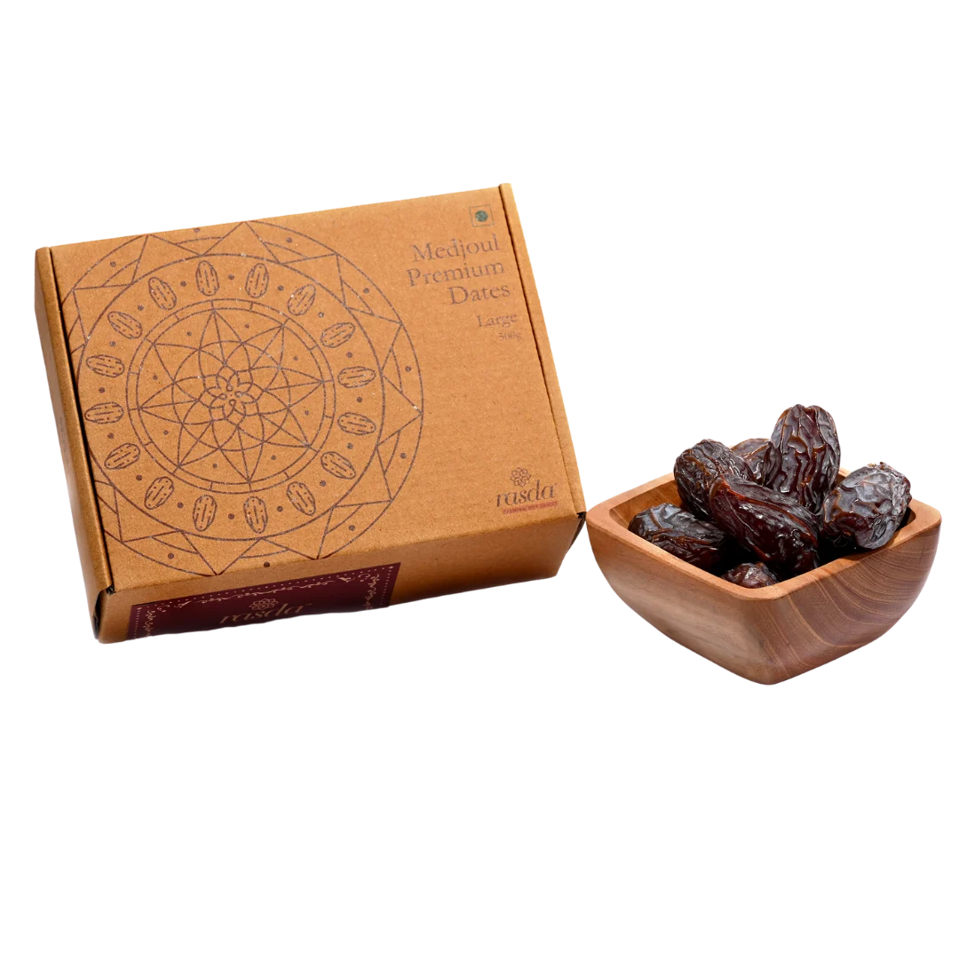 Box of Medjool Dates Large with a wooden bowl on a white background