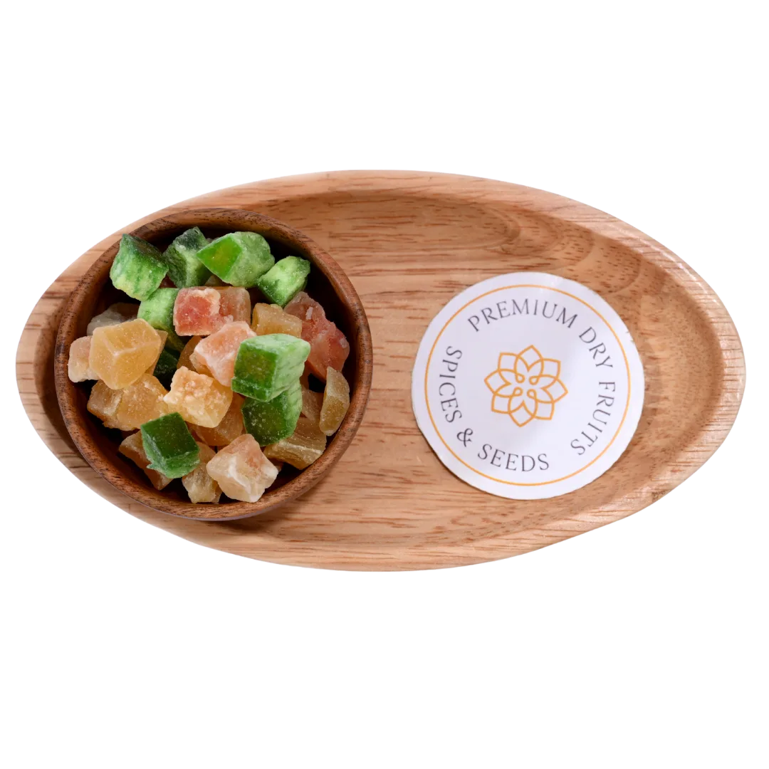 Mixed Dried Fruits Chatpata Dehydrated with a tangy spice coating displayed in a natural wooden bowl.