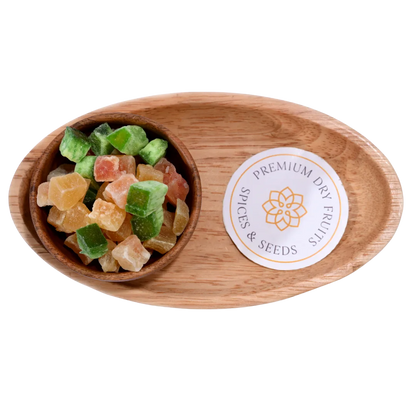 Mixed Dried Fruits Chatpata Dehydrated with a tangy spice coating displayed in a natural wooden bowl.