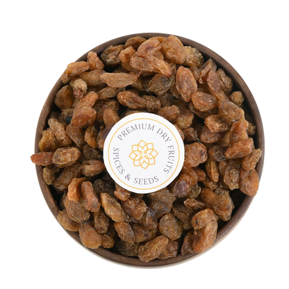 Premium Munakka or Kismis Raisins in Wooden Bowl – Healthy Ayurvedic Dry Fruit Packed with Nutrients and Natural Sweetness