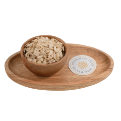 Light beige Muskmelon Seeds / Kharbuja Maga Premium displayed in a wooden bowl, showcasing their smooth texture and natural quality.