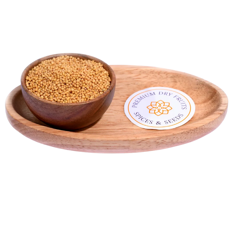 Yellow Mustard Seeds in a wooden bowl showcase fresh, premium-quality seeds for cooking.