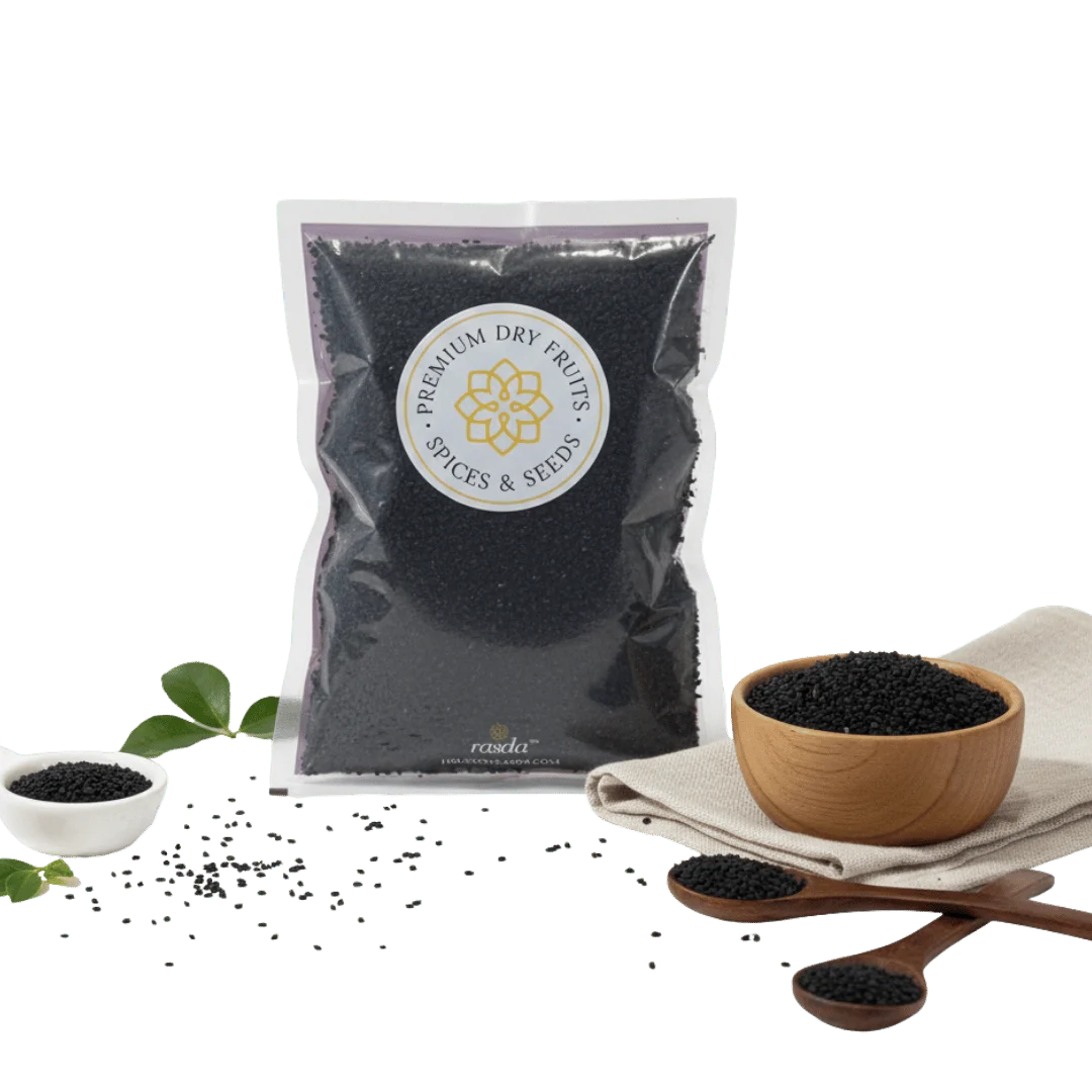 Bag of Nigella Seeds (Kalonji) surrounded by small bowls and a wooden spoon on a white background.