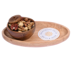Nutty Trail Mix in a wooden bowl showcases a wholesome blend of crunchy nuts and seeds.