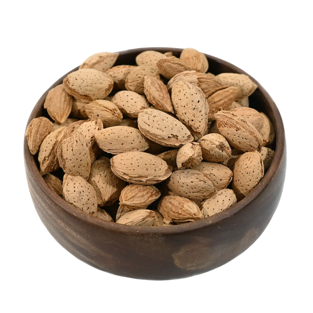 Paper Shell Almonds/ Thin Shelled Almonds/ Kagzi Badam -  Wooden bowl filled with almonds on a white background