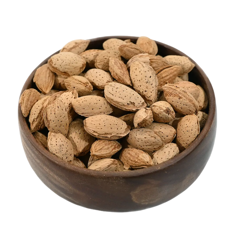 Paper Shell Almonds/ Thin Shelled Almonds/ Kagzi Badam -  Wooden bowl filled with almonds on a white background
