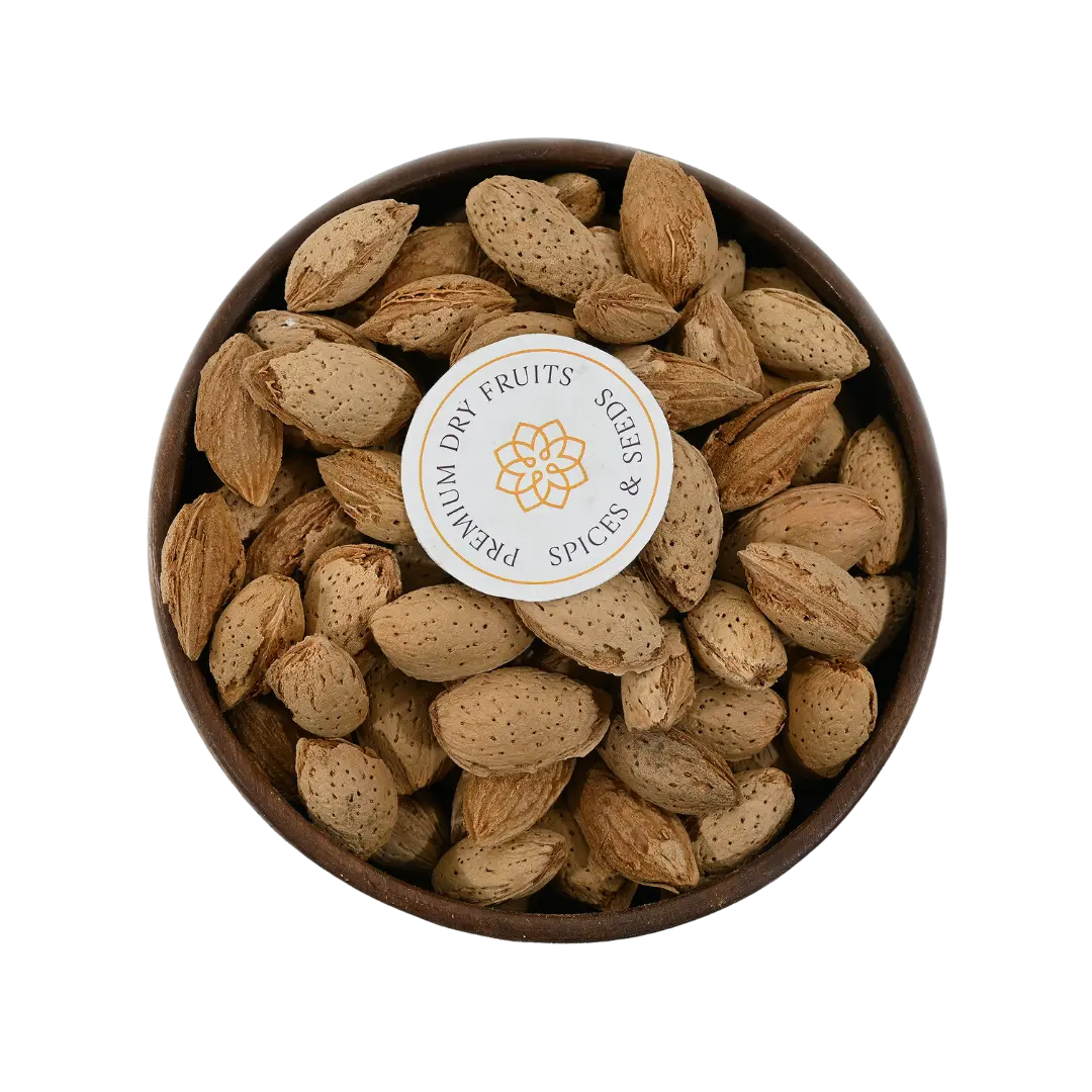 Paper Shell Almonds/ Thin Shelled Almonds/ Kagzi Badam - Wooden bowl filled with almonds on a white background, featuring a label.
