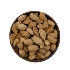 Paper Shell Almonds/ Thin Shelled Almonds/ Kagzi Badam - Wooden bowl filled with almonds on a white background