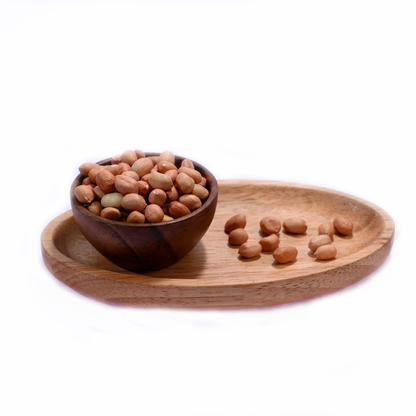 An arrangement of raw peanuts plain in their shells, emphasizing their earthy appearance