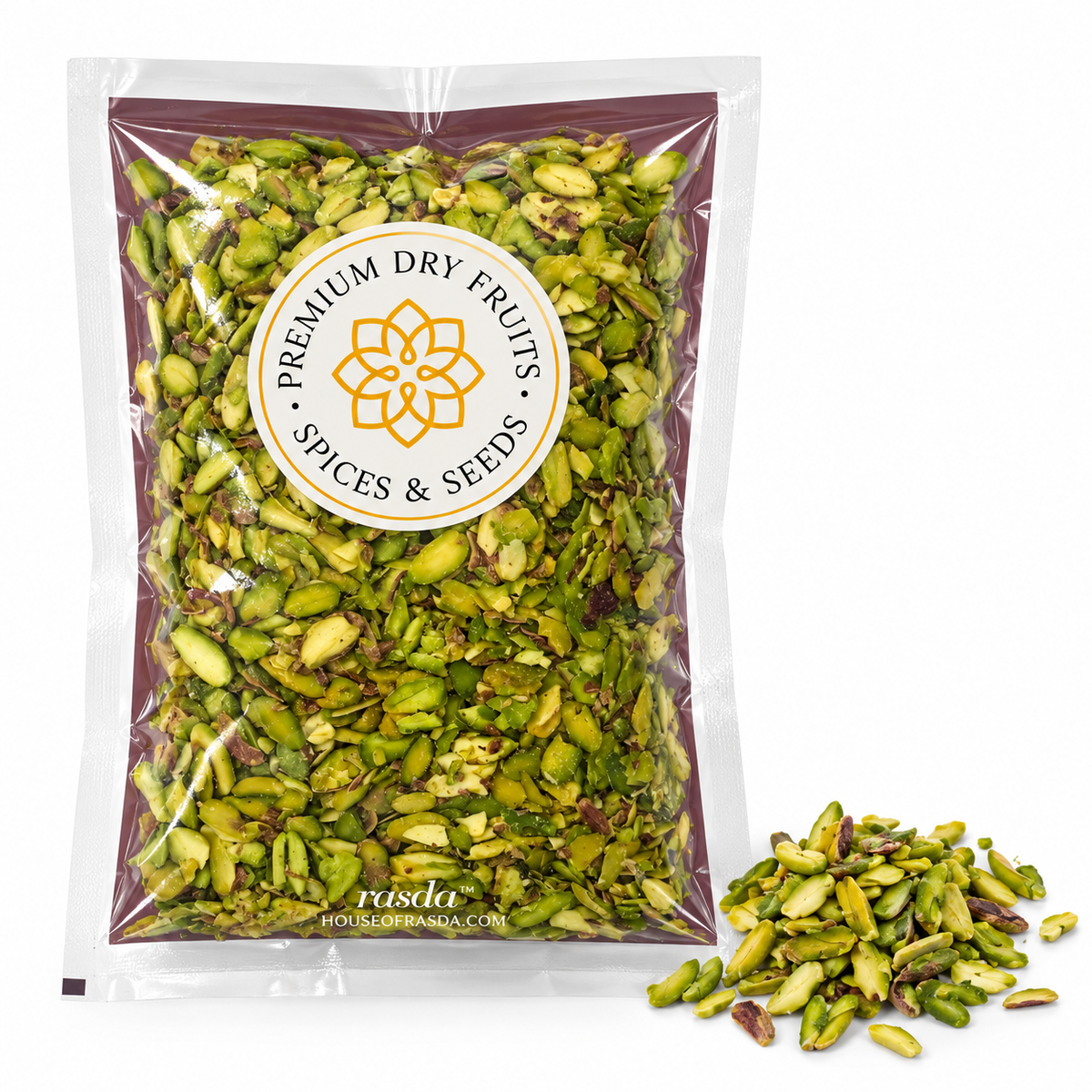 Pistachio slices in a pouch with slices scattered beside it on a white background