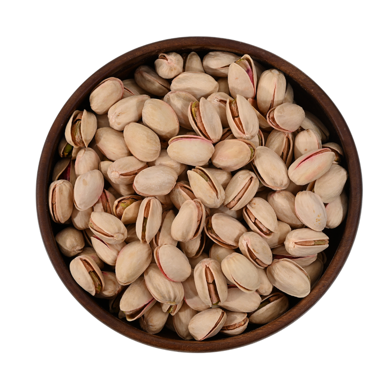 Bowl of crunchy in-shell pistachios, ideal for munching