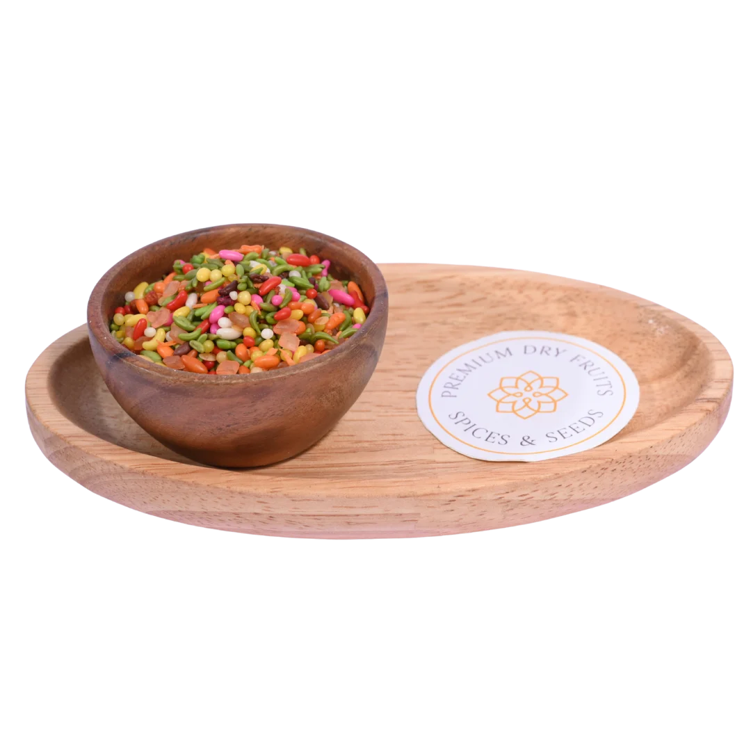 Poona Mix Mouth Freshener in a wooden bowl showcases a colorful blend of seeds and spices.