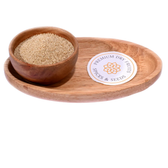 Poppy Seeds / Khus Khus in a wooden bowl showcase tiny, premium-quality edible seeds.