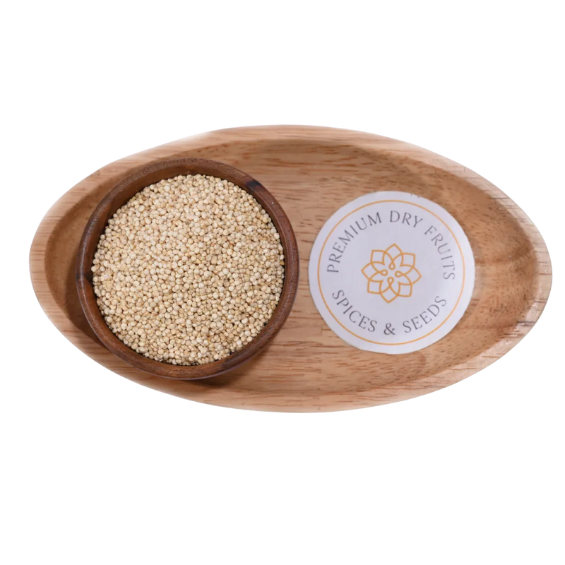 Close-up of Quinoa White Seeds, highlighting their uniform size and unprocessed appearance.