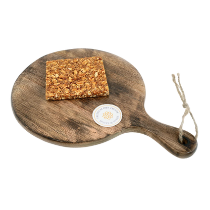 Rajgira Peanut Chikki on wooden plate traditional Indian sweet made with jaggery roasted peanuts and amaranth healthy
